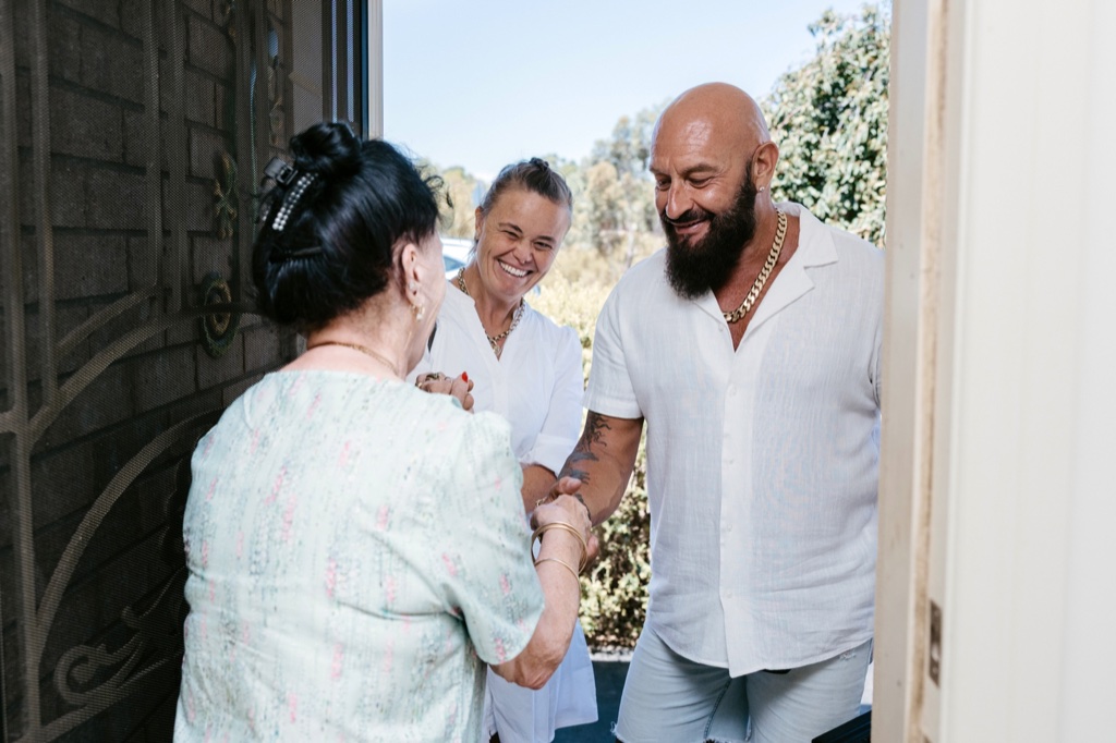 Chris and Sharon Molyneaux at an Adelaide customer's front door, arriving for an in-home gold valuation